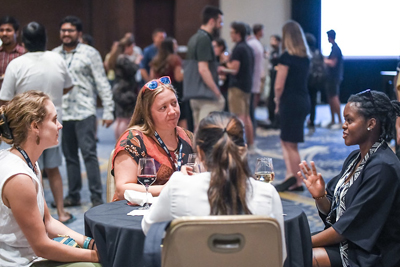 Students get together during the Student Mixer, an event created specifically for them, during JSM 2022.